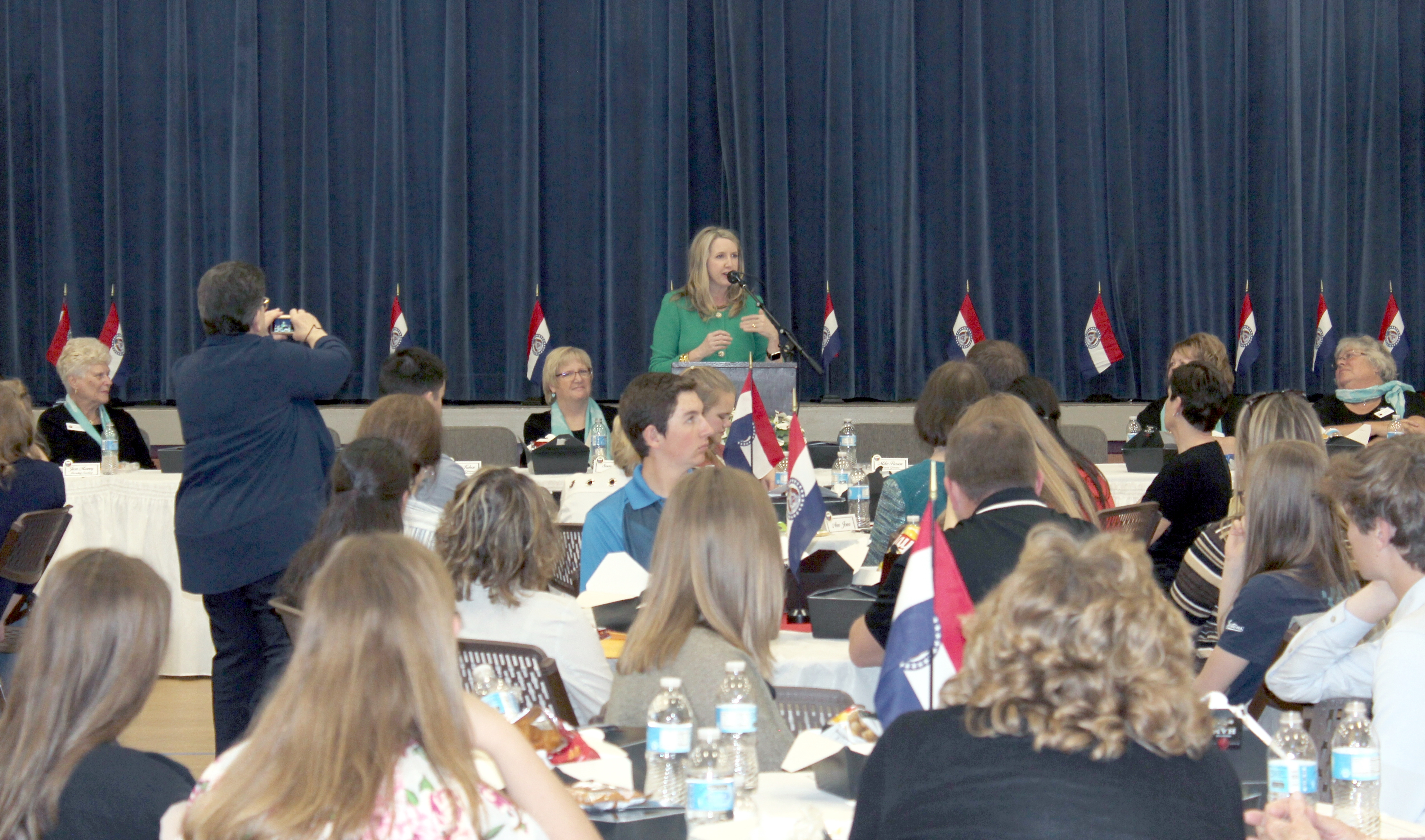 Betsy AuBuchon, first female clerk of of the Supreme Court of Missouri, speaks with student leaders