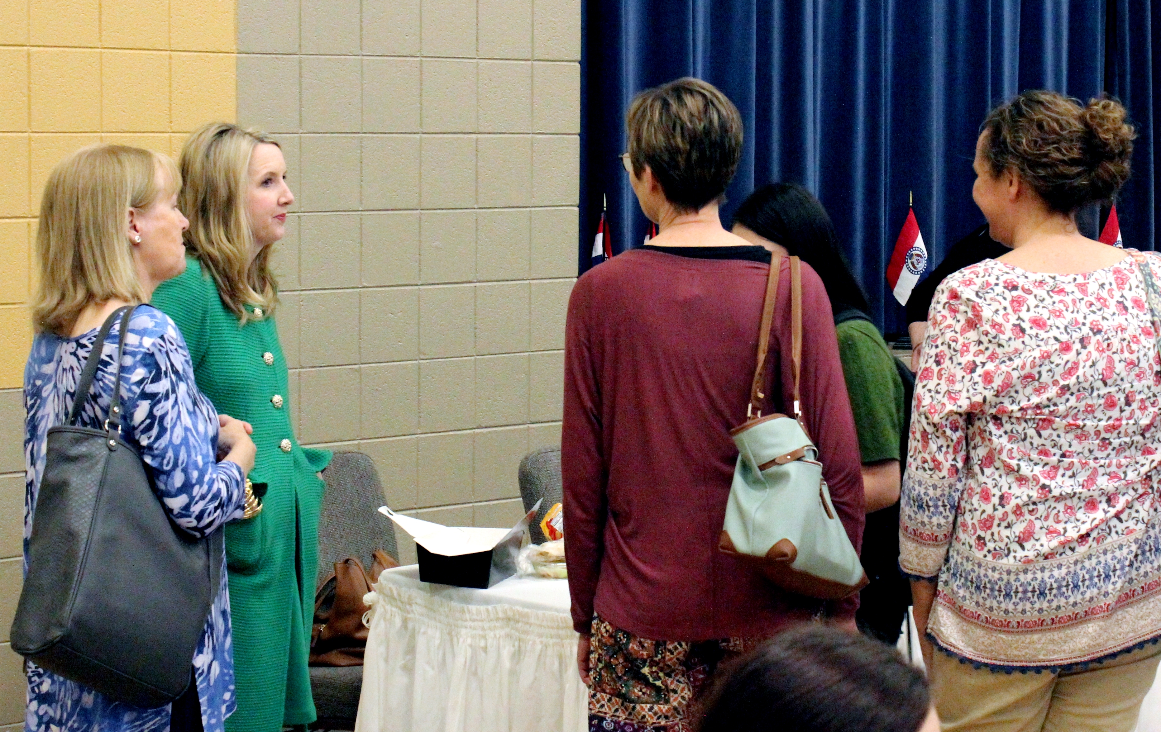 Supreme Court of Missouri Clerk Betsy AuBuchon meets with students after the sophomore pilgrimage luncheon